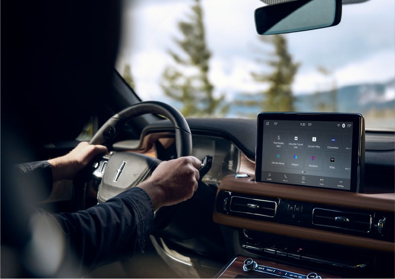The Lincoln+Alexa app screen is displayed in the center screen of a 2023 Lincoln Aviator® Grand Touring SUV | Thomasville Lincoln in Thomasville GA
