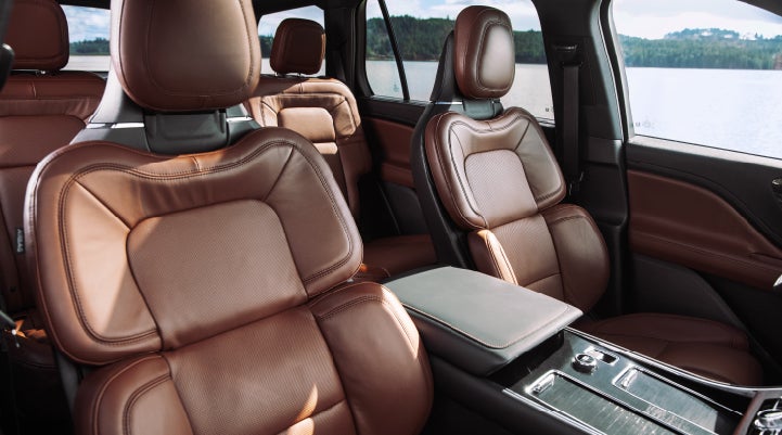 The front row's Perfect Position Seats in a 2024 Lincoln Aviator® Reserve model with Ebony Roast interior | Thomasville Lincoln in Thomasville GA