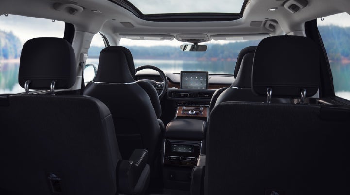 The interior of a 2024 Lincoln Aviator® SUV from behind the second row | Thomasville Lincoln in Thomasville GA