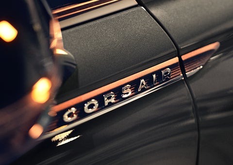 The stylish chrome badge reading “CORSAIR” is shown on the exterior of the vehicle. | Thomasville Lincoln in Thomasville GA